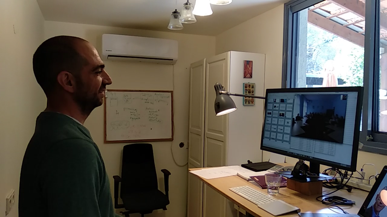 Me presenting in front of the computer
